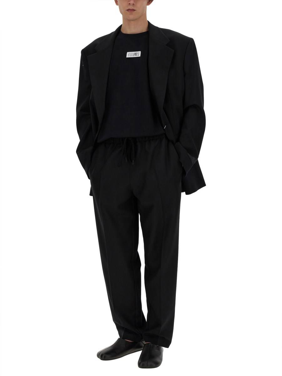 MM6 MAISON MARGIELA PANTALONE IN LANA CON GAMBA AFFUSOLATA Sottocosto
